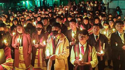 People participate in a demonstration in Nagaland’s Mon district on Sunday night following the killings of civilians. (PTI) People participate in a demonstration in Nagaland’s Mon district on Sunday night following the killings of civilians. (PTI)