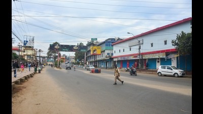A deserted street during Nagaland bandh over the death of the 13 people, who were allegedly killed by Armed Forces, in Dimapur, Monday. (PTI) A deserted street during Nagaland bandh over the death of the 13 people, who were allegedly killed by Armed Forces, in Dimapur, Monday. (PTI)