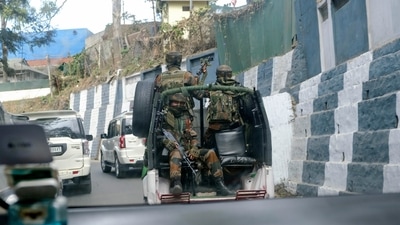 Indian army soldiers ride past the main town in a convoy in Kohima, capital of northeastern Nagaland state, India, Sunday. (AP) Indian army soldiers ride past the main town in a convoy in Kohima, capital of northeastern Nagaland state, India, Sunday. (AP)
