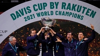 The Russian Tennis Federation team celebrate with the trophy after winning the Davis Cup tennis final at the Madrid Arena in Madrid, Spain, Sunday, Dec. 5, 2021 (AP) The Russian Tennis Federation team celebrate with the trophy after winning the Davis Cup tennis final at the Madrid Arena in Madrid, Spain, Sunday, Dec. 5, 2021 (AP)