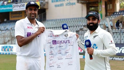 R Ashwin hands Ajaz Patel with a signed jersey after the second Test between India and New Zealand&nbsp; (Twitter/BCCI)
