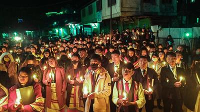 Locals participate in a candle march over the death of 13 people, who were allegedly killed by the armed forces, Mon district, December 5 (PTI) Locals participate in a candle march over the death of 13 people, who were allegedly killed by the armed forces, Mon district, December 5 (PTI)