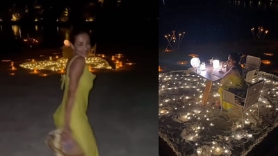 Malaika Arora dining on the beach.&nbsp;