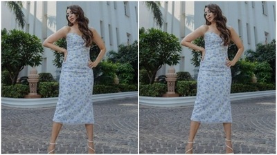 For footwear, Karisma opted for classic white stilettos. (Instagram/@therealkarismakapoor)