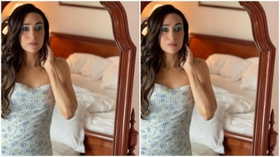 Karisma wore her long tresses open in wavy curls with a side part. (Instagram/@therealkarismakapoor)