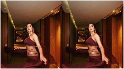 Janhvi paired a halter-neck maroon blouse with a long flowy skirt. (Instagram/@janhvikapoor)