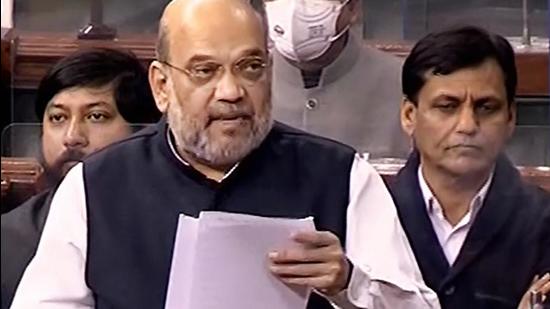 Union home minister Amit Shah speaks in the Lok Sabha during the winter session of Parliament in New Delhi on Monday. (PTI)