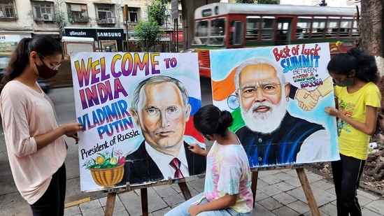 Students in Mumbai paint portraits of Russian President Vladimir Putin and Prime Minister Narendra Modi ahead of former's visit to India, on Saturday.(ANI Photo)