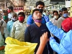 Mumbai: A health worker collects swab samples of a passenger for Covid-19 test at a CSMT railway station, amid possible spread of the Omicron variant in Mumbai,&nbsp;