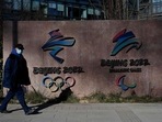 A man walks past the logos of the Beijing 2022 Winter Olympics and Paralympic Winter Games in Shougang Park, one of the sites for the Beijing 2022 Winter Olympics, in Beijing. (AFP) A man walks past the logos of the Beijing 2022 Winter Olympics and Paralympic Winter Games in Shougang Park, one of the sites for the Beijing 2022 Winter Olympics, in Beijing. (AFP)