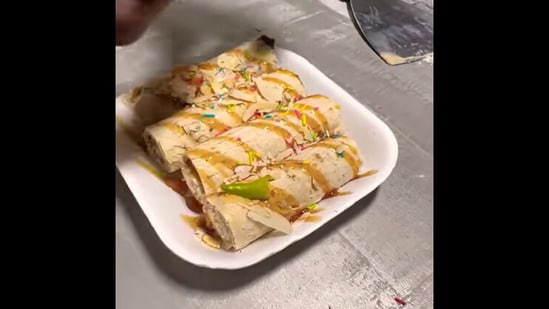 The ice-cream rolls topped and made with chillies.&nbsp;(youtube/@Spoons Of Indore 2.0)
