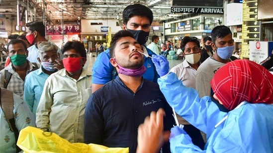 Mumbai: A health worker collects swab samples of a passenger for Covid-19 test at a CSMT railway station, amid possible spread of the Omicron variant in Mumbai,&nbsp;(PTI / File Photo)