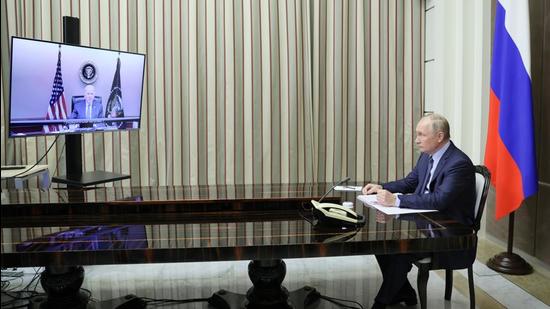 Russian President Vladimir Putin holds talks with US President Joe Biden via a video link in Sochi, Russia on Tuesday. (REUTERS)