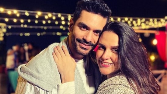 In the pictures, Neha Dhupia and Angad Bedi wore shimmery outfits as they struck different poses for the camera.
