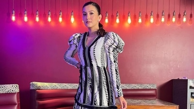 Taking to her social media handle, the diva shared a slew of pictures featuring her in a black and white striped linen midi dress that was made of jacquard cotton fabric. (Instagram/gauaharkhan) Taking to her social media handle, the diva shared a slew of pictures featuring her in a black and white striped linen midi dress that was made of jacquard cotton fabric. (Instagram/gauaharkhan)