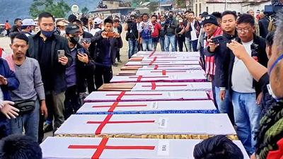Mon: Relatives and locals during the funeral of the 13 people who were allegedly killed by Armed Forces, in Mon district, Monday, Dec. 6, 2021. (PTI Photo)(PTI12_06_2021_000213A) (PTI)