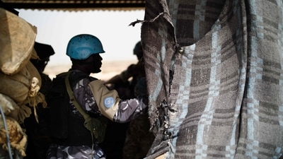 Soldiers of the United Nations Multidimensional Integrated Stabilization Mission in Mali (MINUSMA), looking out over the desert from a watchtower. (AFP File) Soldiers of the United Nations Multidimensional Integrated Stabilization Mission in Mali (MINUSMA), looking out over the desert from a watchtower. (AFP File)
