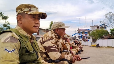 Police guard an area after 14 civilians were killed by Indian security forces over the weekend in Mon district, Nagaland, on December 6, 2021. (AFP) Police guard an area after 14 civilians were killed by Indian security forces over the weekend in Mon district, Nagaland, on December 6, 2021. (AFP)