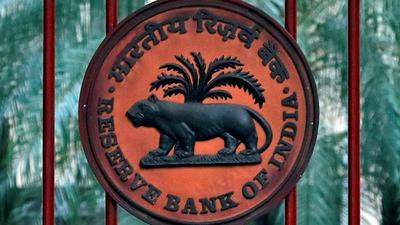 A file photo of the RBI logo at the gate of its office in New Delhi. The central bank on Wednesday kept the repo rate unchanged at 4% while the reverse repo rate remained at 3.35%. (REUTERS) A file photo of the RBI logo at the gate of its office in New Delhi. The central bank on Wednesday kept the repo rate unchanged at 4% while the reverse repo rate remained at 3.35%. (REUTERS)