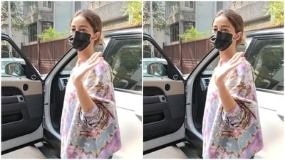 Ananya looked pretty in a multicoloured tie and dye printed sweatshirt. She paired it with a pair of black gym shorts. (HT Photos/Varinder Chawla)