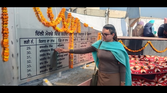 A visitor at the memorial dedicated to 58 farmers from Sangrur who died during the agitation against the Centre’s three agriculture laws, in Sangrur on Wednesday.
