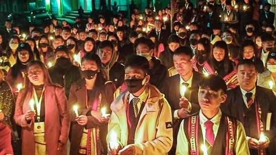 People participate in a demonstration in Nagaland’s Mon district on Sunday night following the killings of civilians. (PTI)