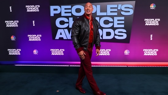 People's Champion Award recipient Dwayne Johnson arrives for the 47th ceremony of the People's Choice Awards. REUTERS/Mike Blake