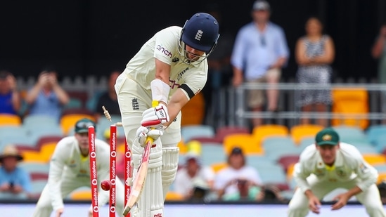 England's Rory Burns is out bowled during day one of the first Ashes cricket test at the Gabba in Brisbane, Australia.(AP)