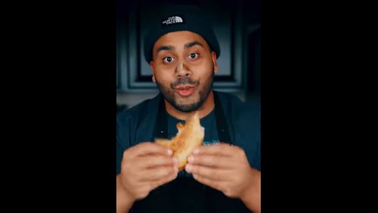 Chef Shihan Chowdhury holding the paratha puff pasty pizza he made. (instagram/@chilipeppercooks) Chef Shihan Chowdhury holding the paratha puff pasty pizza he made. (instagram/@chilipeppercooks)