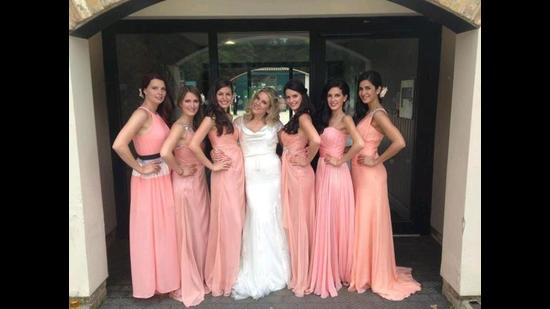 Katrina with her sisters at Christine’s wedding. From left: Stephanie Turcotte, Melissa Turcotte, Sonia Turcotte, Christine Spencer, Natacha Turcotte, Isabelle and Katrina.