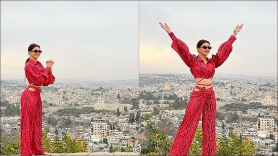 The Bollywood diva is one of the panellists for Miss Universe 2021 but taking some time off work, Urvashi was seen raising the bar of fashion goals in the red co-ord set.(Instagram/urvashirautela)