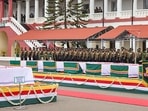 Officers pay tribute to CDS General Bipin Rawat, his wife Madhulika Rawat and 11 other armed forces personnel killed in the IAF's Mi-17V5 helicopter crash in Tamil Nadu.(PTI) Officers pay tribute to CDS General Bipin Rawat, his wife Madhulika Rawat and 11 other armed forces personnel killed in the IAF's Mi-17V5 helicopter crash in Tamil Nadu.(PTI)