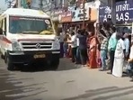 Locals can be seen chanting slogans and showering flower petals on the ambulances carrying the mortal remains of CDC Rawat and others who died in chopper crash on Wednesday.(ANI) Locals can be seen chanting slogans and showering flower petals on the ambulances carrying the mortal remains of CDC Rawat and others who died in chopper crash on Wednesday.(ANI)