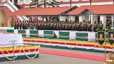 Officers pay tribute to CDS General Bipin Rawat, his wife Madhulika Rawat and 11 other armed forces personnel killed in the IAF's Mi-17V5 helicopter crash in Tamil Nadu. (PTI) Officers pay tribute to CDS General Bipin Rawat, his wife Madhulika Rawat and 11 other armed forces personnel killed in the IAF's Mi-17V5 helicopter crash in Tamil Nadu. (PTI)