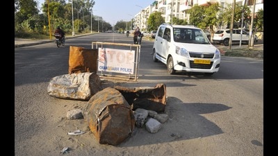 A damaged road in Sector 51, Chandigarh, at ward number 32 on Tuesday. (Keshav Singh/HT) A damaged road in Sector 51, Chandigarh, at ward number 32 on Tuesday. (Keshav Singh/HT)