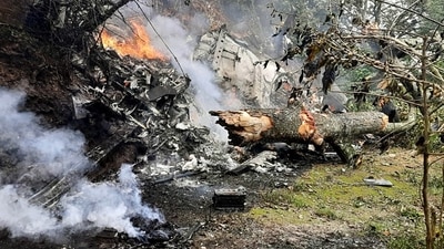 The chopper went up in flames after it crashed in Coonoor on Wednesday. (ANI) The chopper went up in flames after it crashed in Coonoor on Wednesday. (ANI)