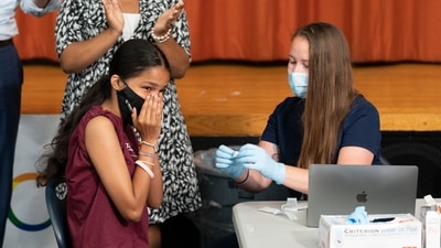 The US is expanding Covid-19 boosters, ruling that 16- and 17-year-olds can get a third dose of Pfizer’s vaccine. (AP)