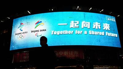 An outdoor screen shows the slogan for Beijing 2022 Winter Olympics and Paralympic Games, which reads ‘Together for a Shared Future’, in Beijing. Prime Minister Justin Trudeau has announced that Canada will follow others like the US in undertaking a diplomatic boycott of the 2022 Winter Olympics in Beijing, China. (AFP) An outdoor screen shows the slogan for Beijing 2022 Winter Olympics and Paralympic Games, which reads ‘Together for a Shared Future’, in Beijing. Prime Minister Justin Trudeau has announced that Canada will follow others like the US in undertaking a diplomatic boycott of the 2022 Winter Olympics in Beijing, China. (AFP)