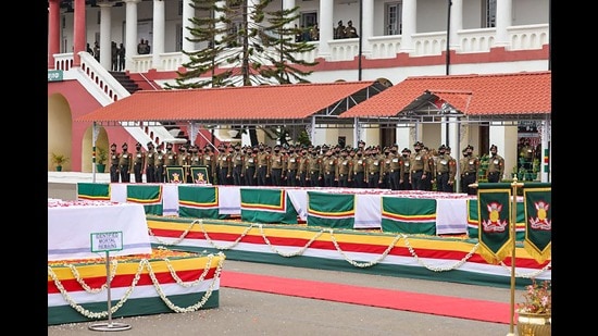 Wellington: Officers pay tribute to CDS Gen Bipin Rawat, his wife Madhulika Rawat and 11 other armed forces personnel killed in an IAF's Mi-17V5 helicopter crash in Tamil Nadu on Wednesday, at Madras Regimental Centre (PTI) Wellington: Officers pay tribute to CDS Gen Bipin Rawat, his wife Madhulika Rawat and 11 other armed forces personnel killed in an IAF's Mi-17V5 helicopter crash in Tamil Nadu on Wednesday, at Madras Regimental Centre (PTI)
