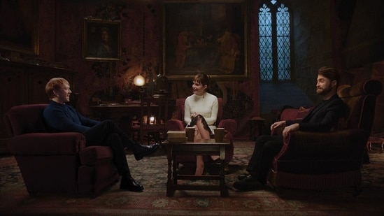 Daniel Radcliffe, Emma Watson and Rupert Grint take a seat in the Gryffindor common room as part of Harry Potter Return to Hogwarts.