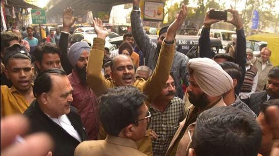 The drive went smoothly at Old Sabzi Mandi Road, Books Market, Kesar Ganj and Rekhi Cinema Road but when the team seized counter installed outside a mobile repair chowk on Clock Tower Road, the counter owner claimed cash in the drawer of the counter. (HT Photo)