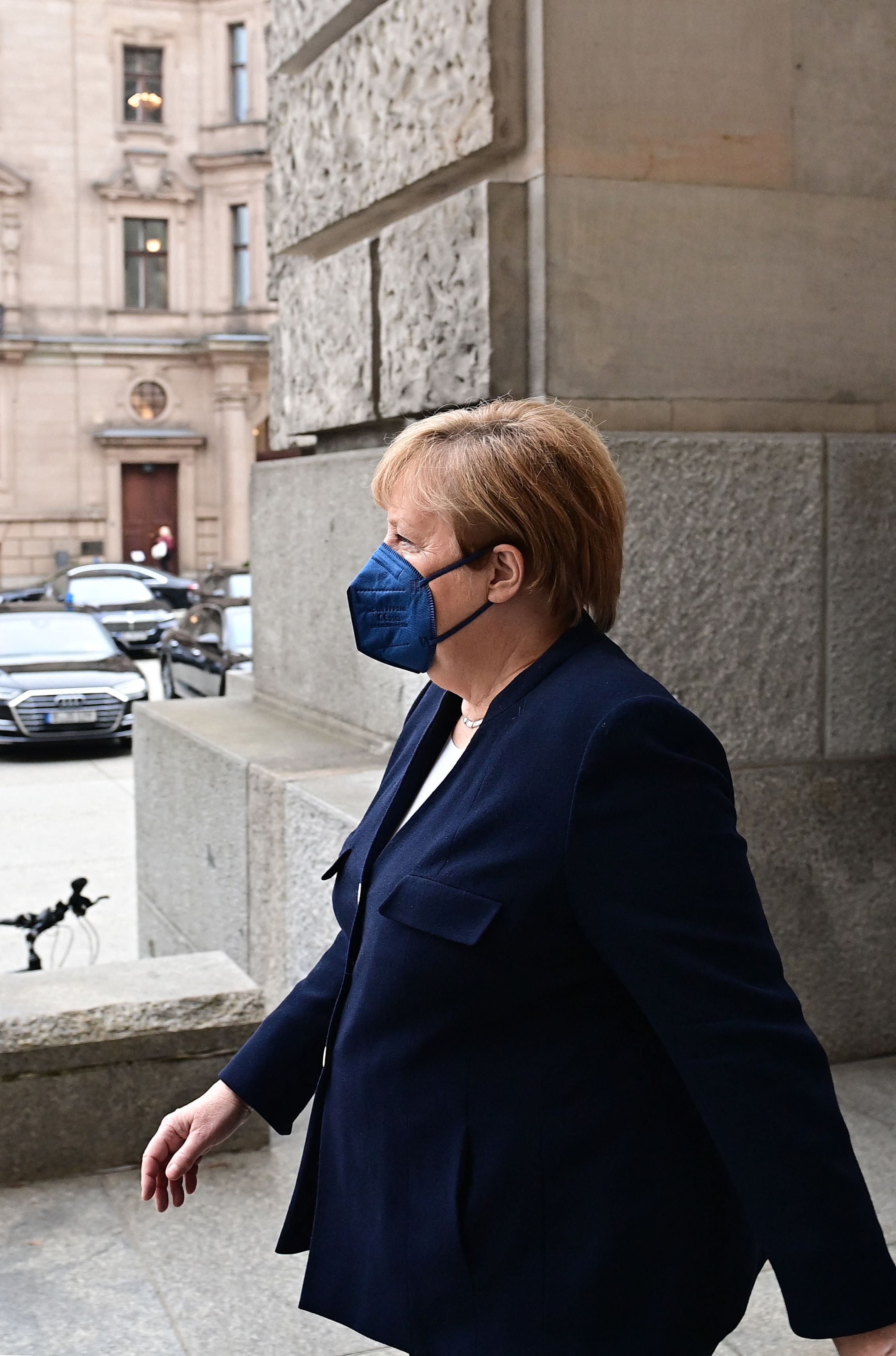 Outgoing German Chancellor Angela Merkel as she leaves the Bundestag (lower house of parliament) in Berlin. (AFP) Outgoing German Chancellor Angela Merkel as she leaves the Bundestag (lower house of parliament) in Berlin. (AFP)