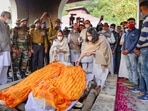 Kritika and Tarini, daughters of late Chief of Defence Staff (CDS) Gen Bipin Rawat and Madhulika Rawat, during the cremation of their parents at Brar Square crematorium, in New Delhi, Friday, Dec. 10, 2021. General Rawat was killed along with his wife and 11 armed forces personnel in an Indian Air Force (IAF) helicopter crash near Coonoor in Tamil Nadu on Wednesday. (PTI)