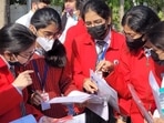 CBSE Class 12 Physics term 1: Students at GD Goenka Public School Lucknow discussing the CBSE Physics Class 12 question paper after the exam on Friday, December 10, 2021. (HT Photo) CBSE Class 12 Physics term 1: Students at GD Goenka Public School Lucknow discussing the CBSE Physics Class 12 question paper after the exam on Friday, December 10, 2021. (HT Photo)