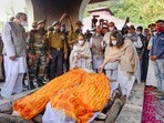 Kritika and Tarini, daughters of late CDS Gen Bipin Rawat and Madhulika Rawat, during the cremation of their parents at Brar Square crematorium, in New Delhi.(PTI) Kritika and Tarini, daughters of late CDS Gen Bipin Rawat and Madhulika Rawat, during the cremation of their parents at Brar Square crematorium, in New Delhi.(PTI)