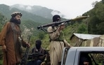 Pakistani Taliban patrol in then their stronghold of Shawal in Pakistani tribal region of South Waziristan. Pakistani Taliban patrol in then their stronghold of Shawal in Pakistani tribal region of South Waziristan.