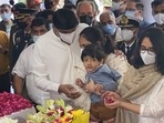 Bipin Rawat's daughters, grandkid offer their last respect to the CDS and his wife Madhulika Rawat.&nbsp;