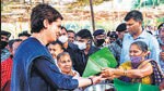 Congress general secretary Priyanka Gandhi Vadra purchases local produce from a tribal woman of Morpirla village, in south Goa, on Friday. (ANI)
