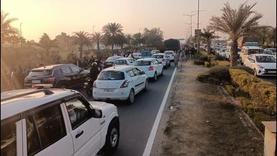 People going to airport and other commuters were at receiving end after members of the All India Truck Ekta Union blocked the Chhat light point on the Airport Road in Mohali on Friday. People going to airport and other commuters were at receiving end after members of the All India Truck Ekta Union blocked the Chhat light point on the Airport Road in Mohali on Friday.