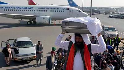 Kabul, Dec 10 (ANI): A Sikh delegation with the Holy book of Guru Granth Sahib boarding a plane for India from Afghanistan under Operation Devi Shakti, in Kabul on Friday. (ANI Photo) (ANI) Kabul, Dec 10 (ANI): A Sikh delegation with the Holy book of Guru Granth Sahib boarding a plane for India from Afghanistan under Operation Devi Shakti, in Kabul on Friday. (ANI Photo) (ANI)